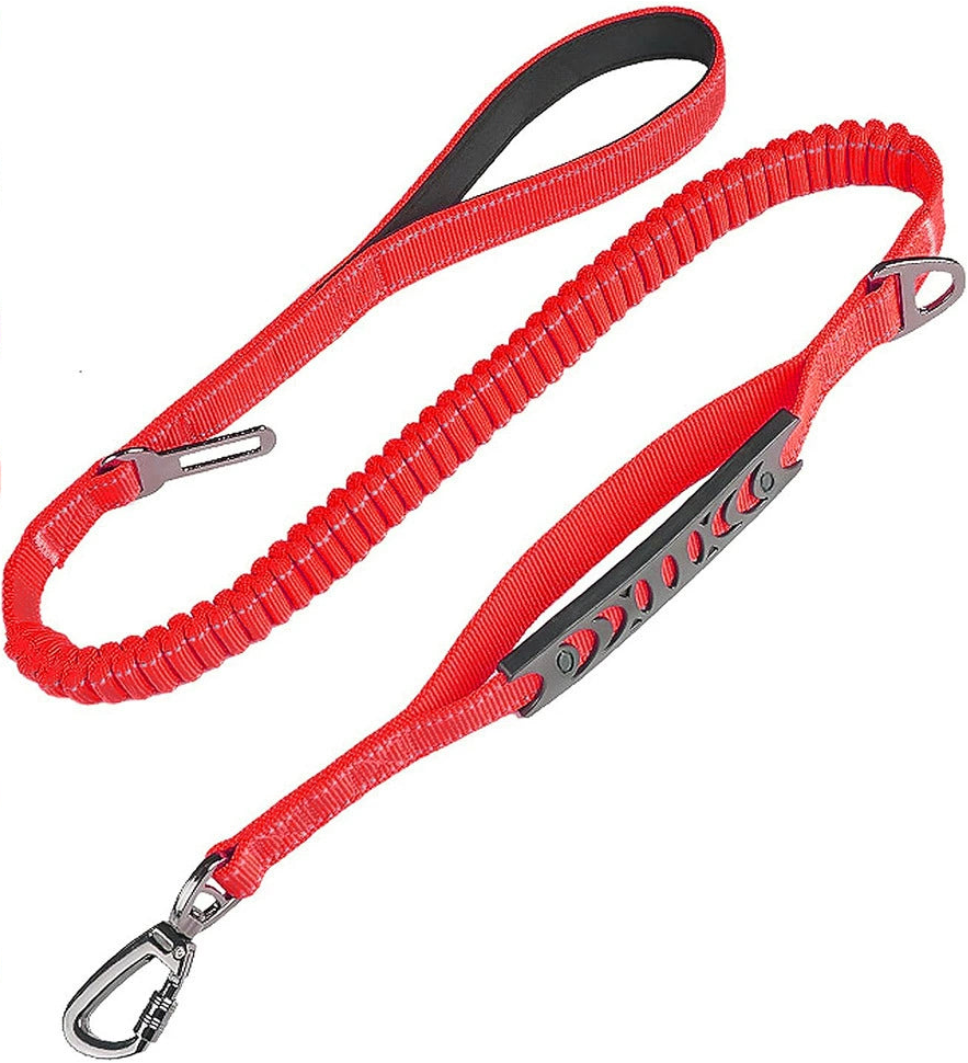 A red bungee dog lead with a padded handle, a short traffic handle, a swivel carabiner and a car seatbelt clip.