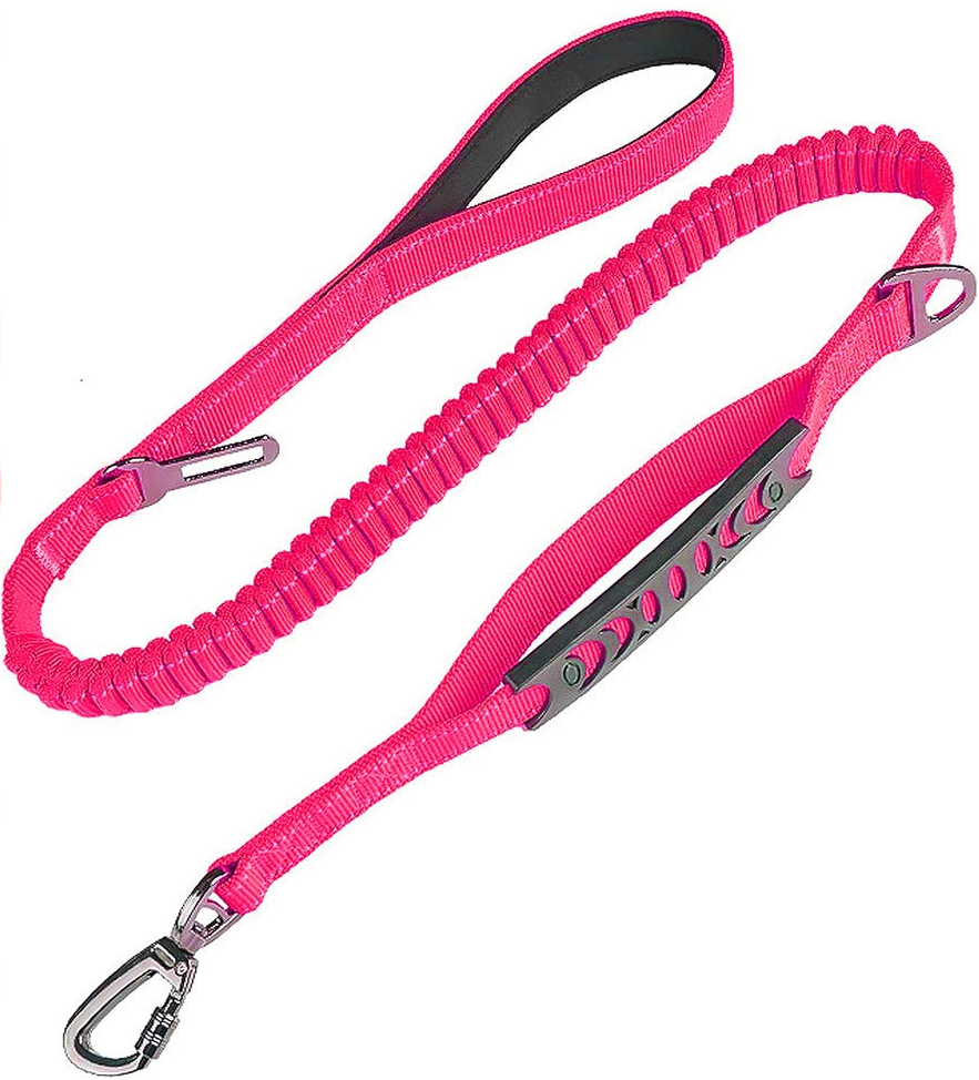 A hot pink bungee dog lead with a padded handle, a short traffic handle, a swivel carabiner and a car seatbelt clip.