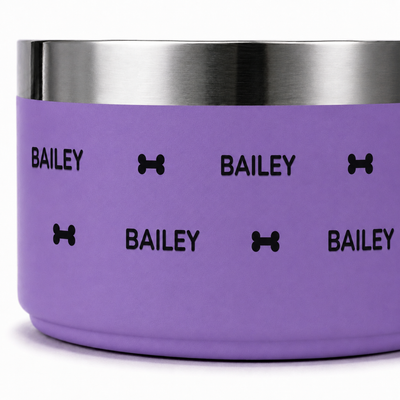Close-up of a lilac Personalised Wraparound Dog Bowl showing the crisp repeating name print and the polished stainless steel rim