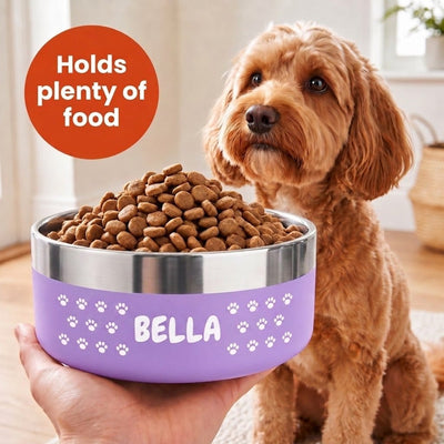 Lilac Personalised Pattern Dog Bowl held in one hand, the name BELLA set into a band of white paw prints
